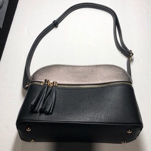 In great condition black & gray metallic purse